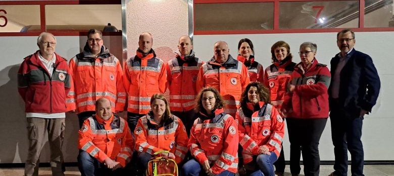 Bild von Personen in Roten Jacken